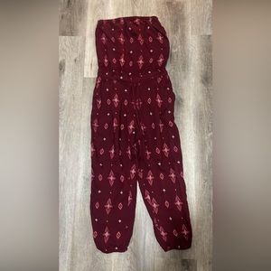 Burgundy jumpsuit Size small. New with tag